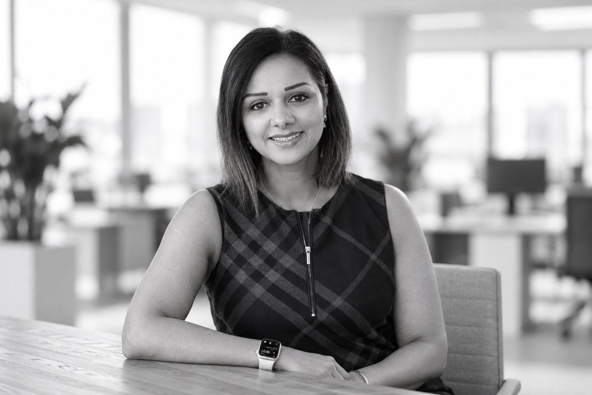 Black and white portrait of Sharan Dhesi