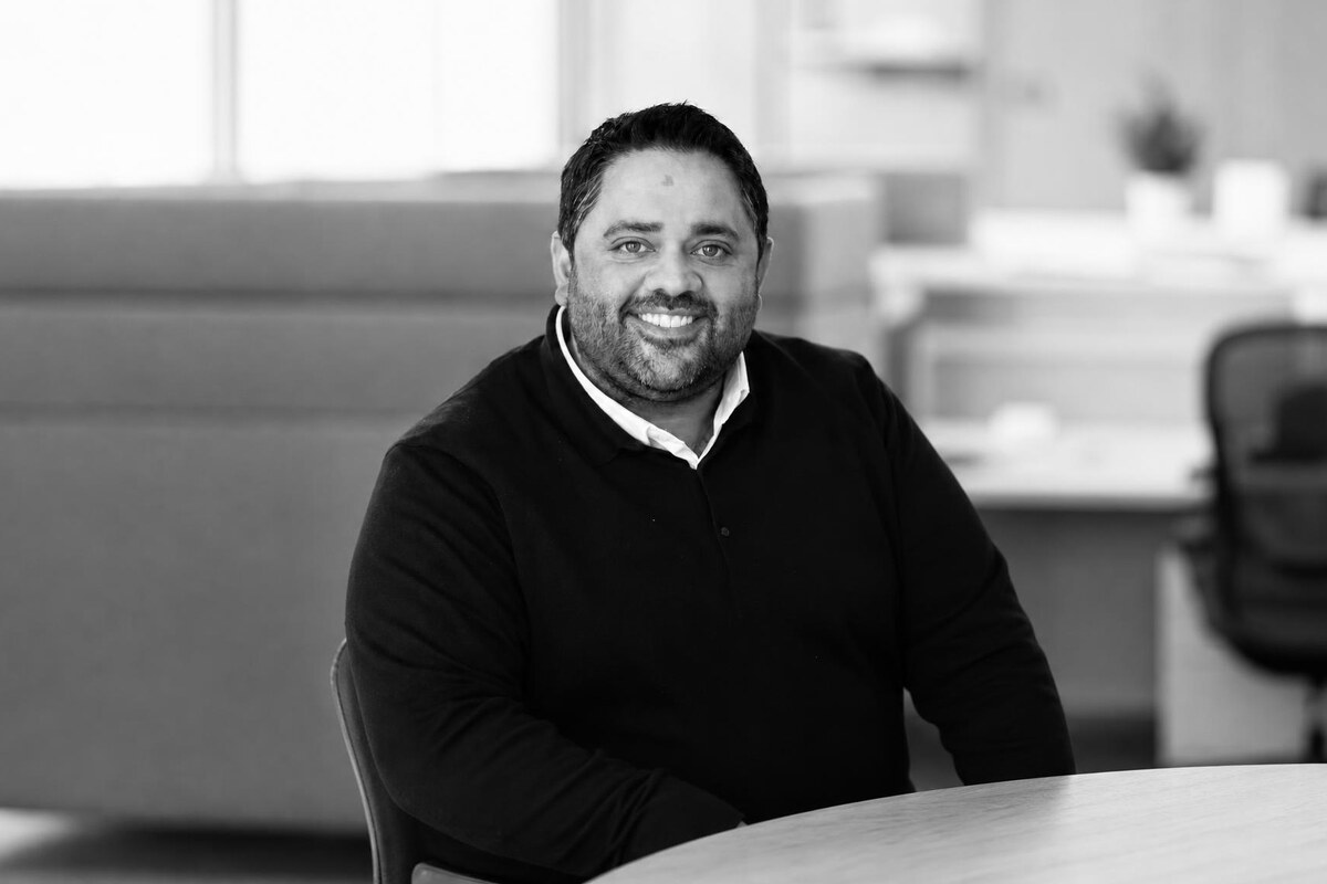 Black and white portrait of Sim Khatkar